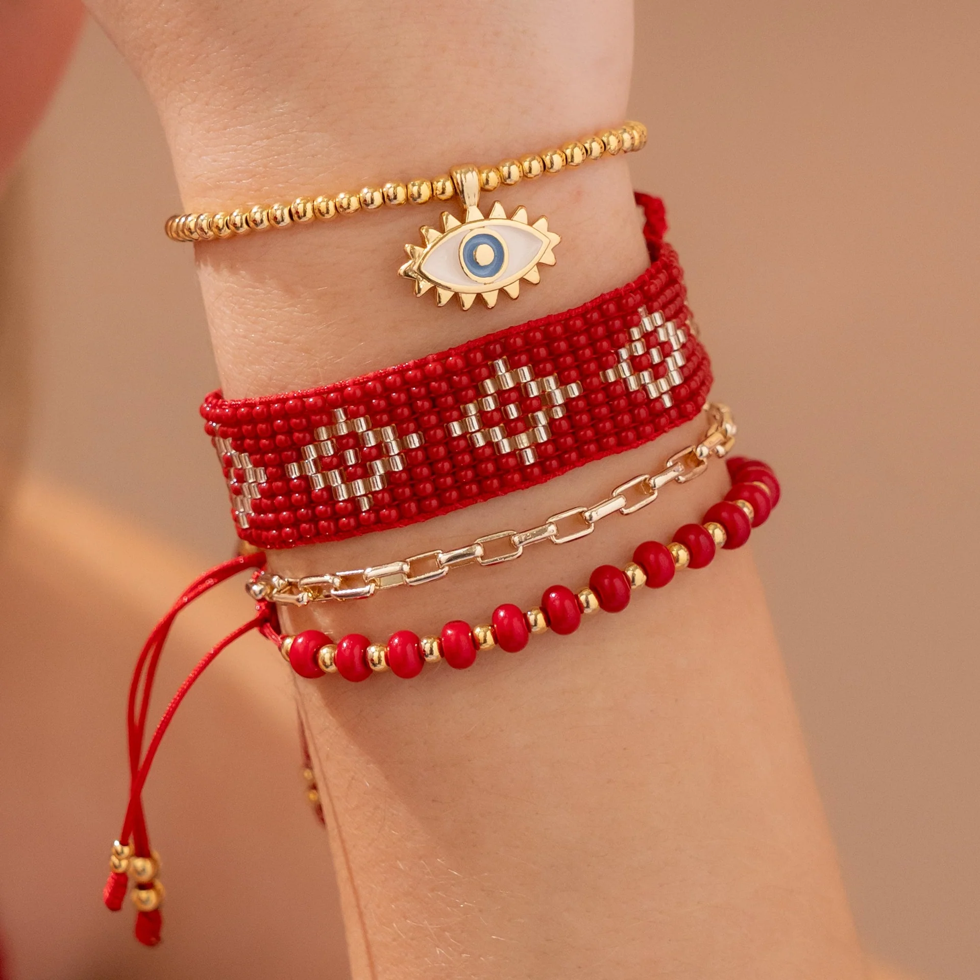 [11443] Set x 4 Pulseras Tejida Ojo